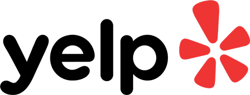 The image shows the Yelp logo, featuring the word "yelp" in black lowercase letters. To the right of the text, there is a red starburst shape composed of five elongated, rounded triangles arranged in a circular pattern. This logo is frequently seen when searching for a trusted veterinarian or vet reviews.