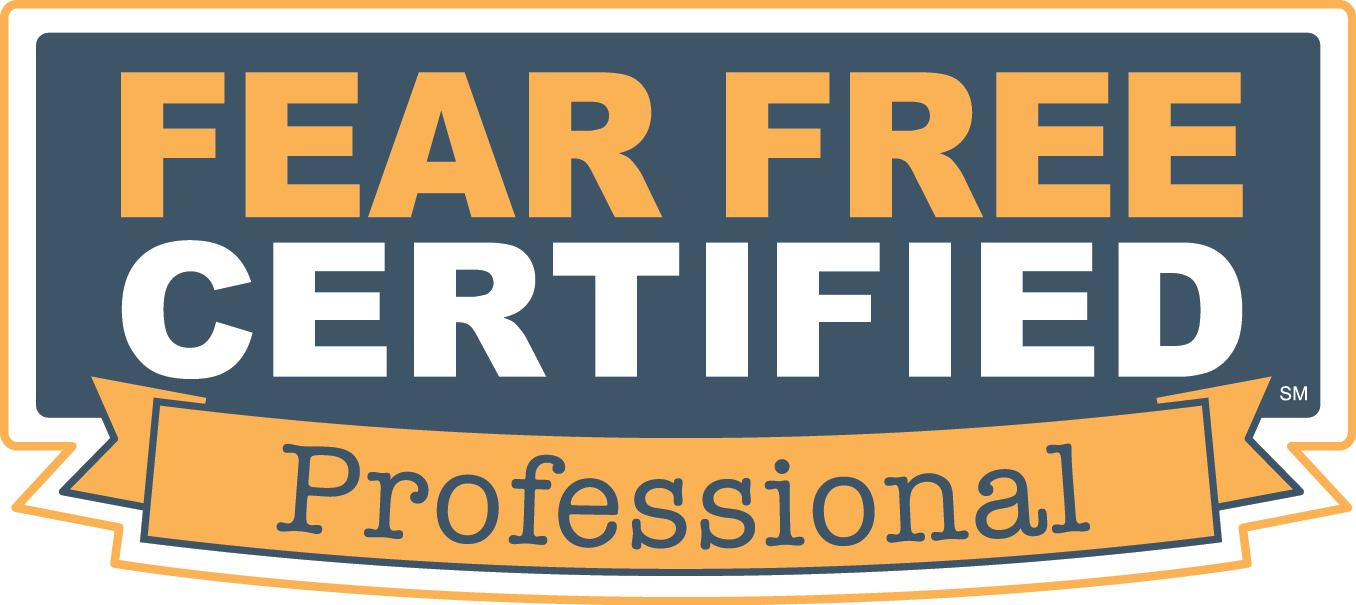 A logo with a dark blue background and orange and white text. The top part reads "FEAR FREE CERTIFIED" in bold, white capital letters. Below, a banner in orange with dark blue letters says "Professional Veterinarian.